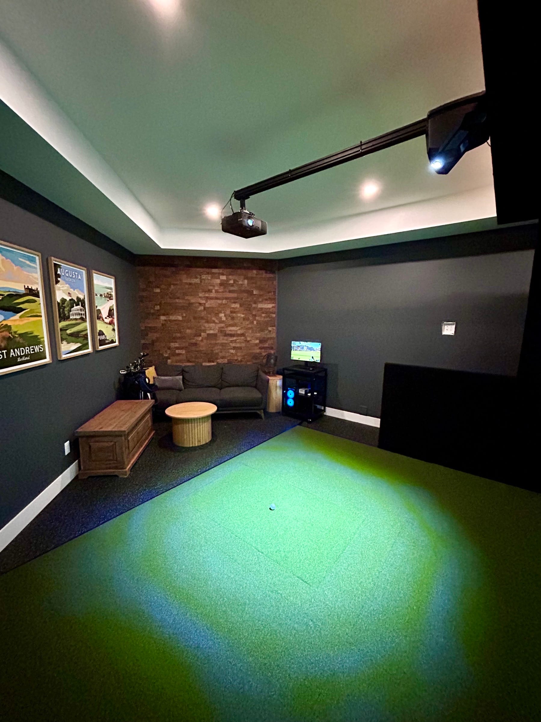 Bay with framed course posters and seating